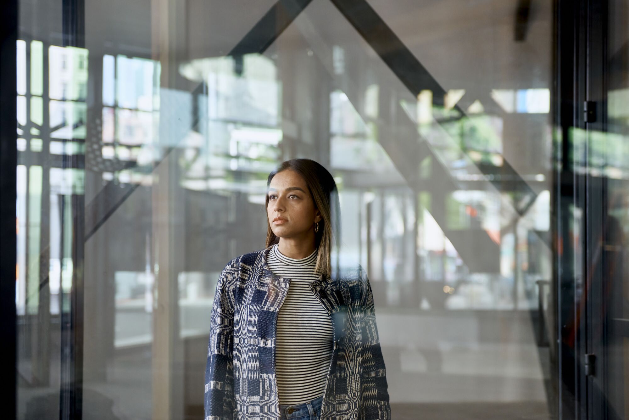 Zehra behind a window