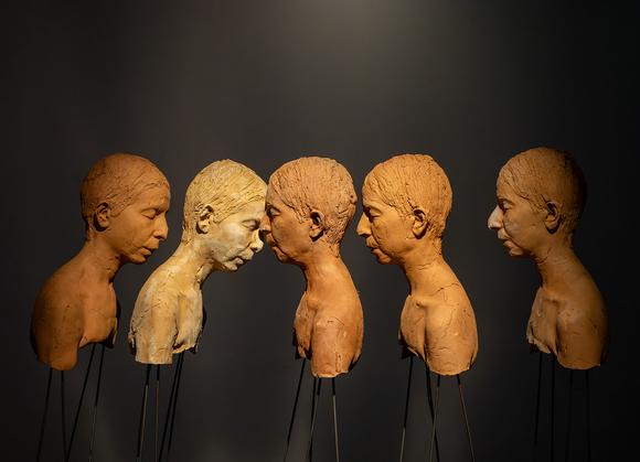 color profile view of clay busts in the OXY ARTS gallery