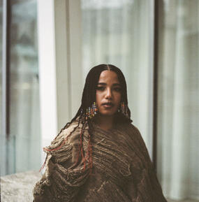 color medium-full portrait of Josèfa Ntjam