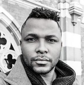 close-up black & white portrait of Reyson Velásquez