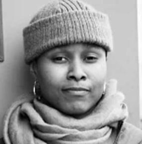 close-up black & white portrait of Sydney Cain