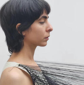 profile close-up color portrait of Roskana Pirouzmand