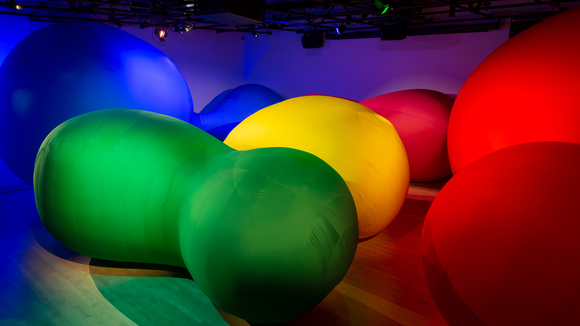 Colored inflatables of various colors, shapes, and sizes