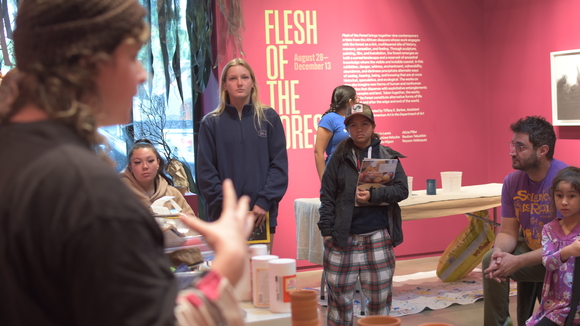 Teacher explaining workshop themes.