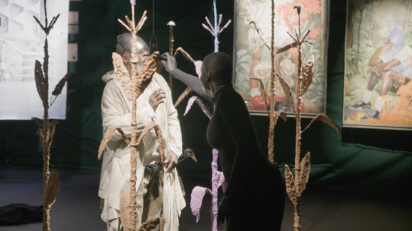 color video still of Everett Saunders and Marjani Forté-Saunders dancing in the gallery