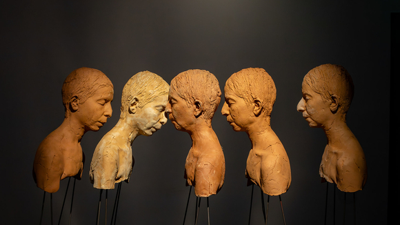 color profile view of clay busts in the OXY ARTS gallery