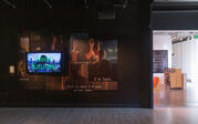 A video installation with a variety of images projected onto a wall