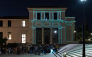 projection on building of the buildings outline in blue