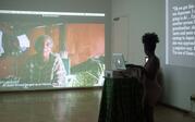 projection of video with women retelling a story