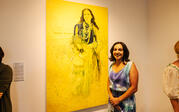 Katie Dorame with her painting, 'Sunbridge'