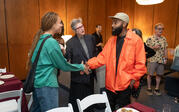 Tavares Strachan shaking hands with an Oxy student after the talk.