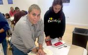 People printmaking with linoleum. 