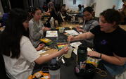 People making art with clay and watercolor
