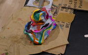 People making art with clay and watercolor