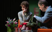 profile medium shot Miranda July gazes at audience