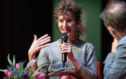 medium Miranda July speaking on stage