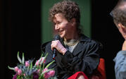 profile medium full shot Miranda July speaking to audience