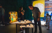 Man observing Jerome P. Dent's, "The White Box"