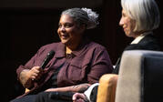 Closeup of Roxane Gay and Alexandra Grant on stage