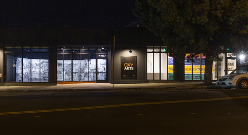 Exterior view of the OXY ARTS building at night