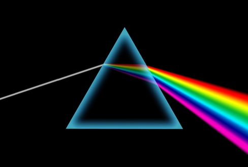 Rendering of prism on black background showing how a rainbow light refracts when white light hits the prism