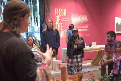 Teacher explaining workshop themes.