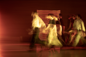 Dancers move in a blur