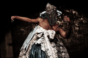 A woman dances in the traditional Afro-Brazilian style