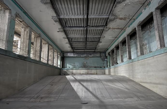 full color wide shot of an empty underground pool