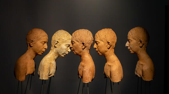 color profile view of clay busts in the OXY ARTS gallery
